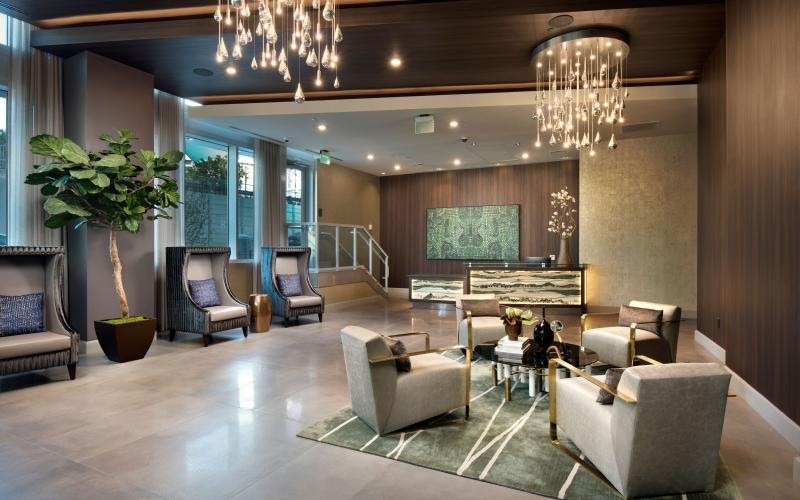 a clubhouse room with chairs and tables