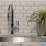 a kitchen with a plant on the counter