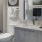 a bathroom with a marble countertop